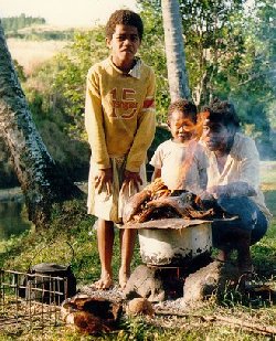 Children often help with gathering firewood and cooking.
